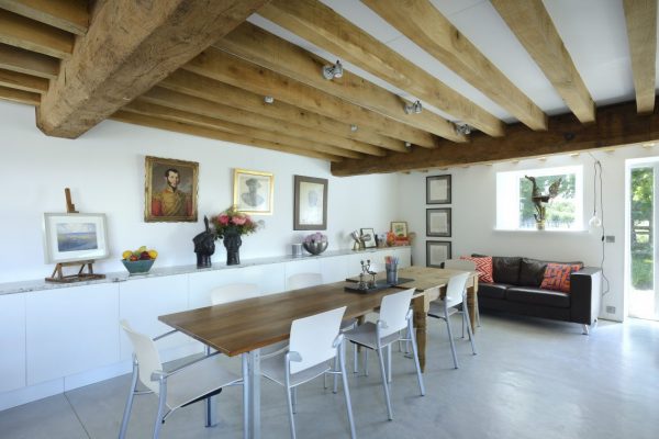 A sustainable listed barn conversion on the Somerset Levels by the creative O2i Design Ltd - dining room